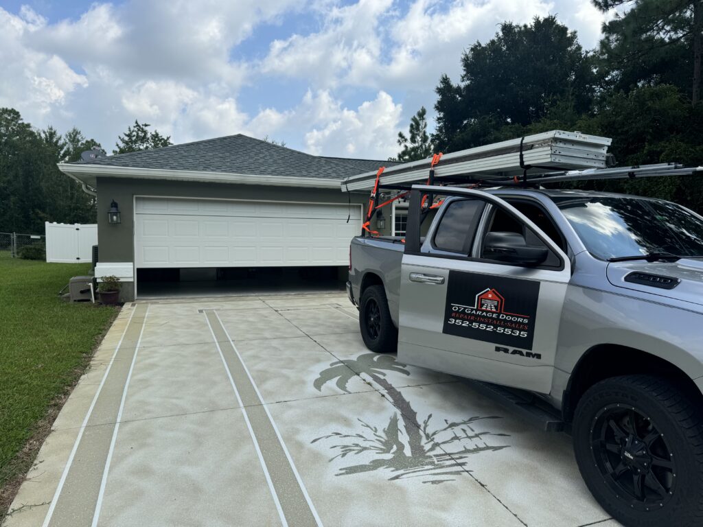 Revive Garage Doors service truck at residential garage door repair job in Ocala FL